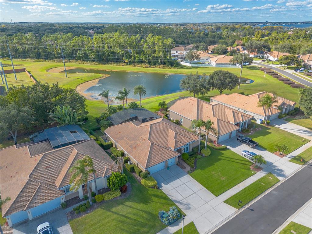 10915 Ledgement Lane Windermere, FL 34786 - Photo 57 of 60 an aerial view of a house with a swimming pool yard and outdoor seating