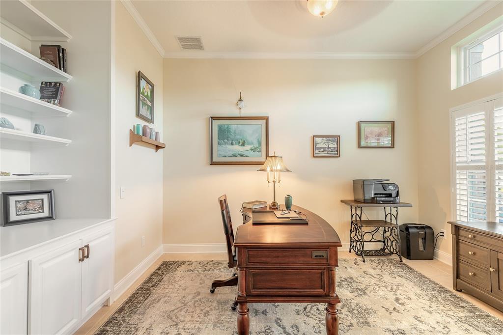 10915 Ledgement Lane Windermere, FL 34786 - Photo 9 of 60 a workspace with furniture and window