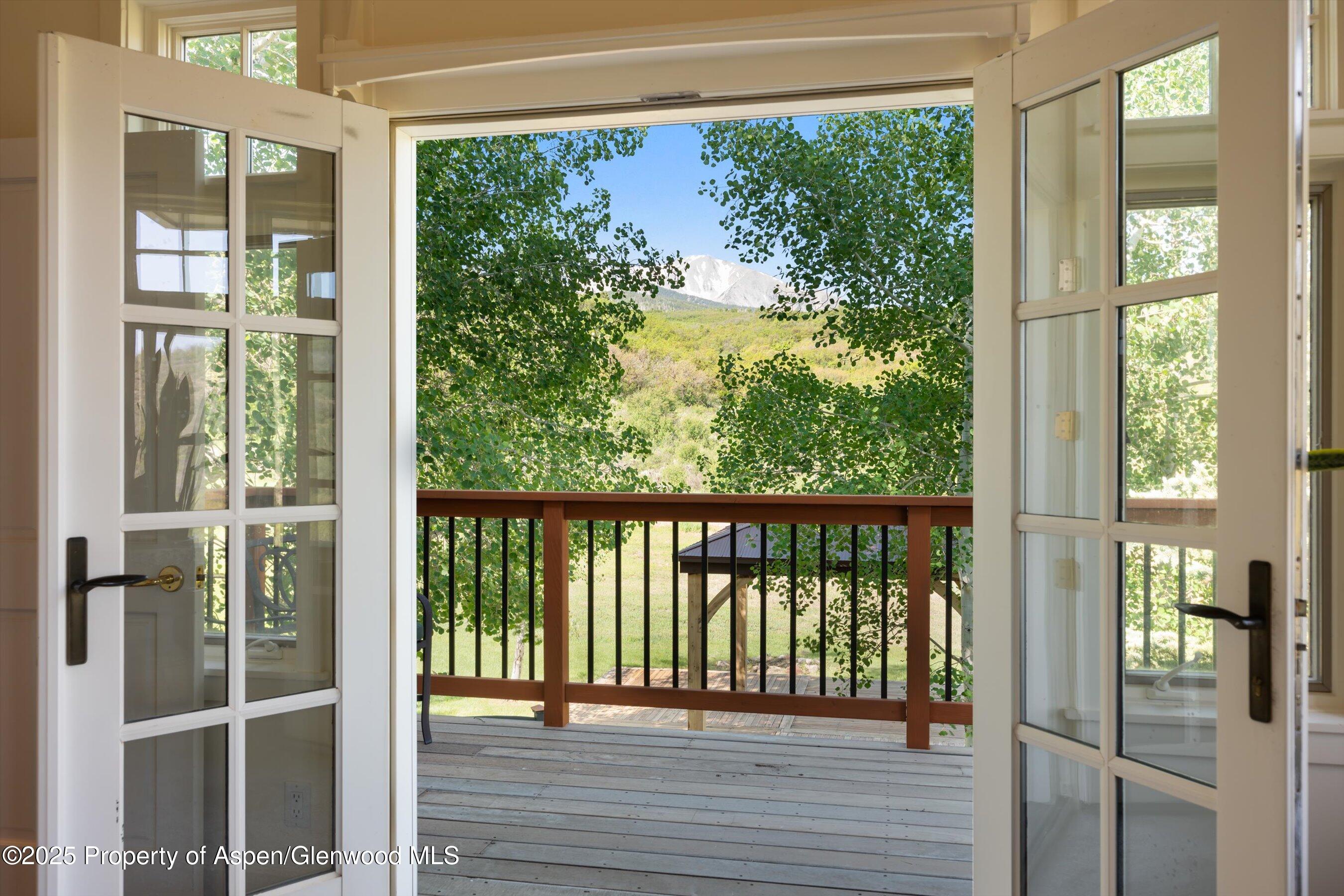 2240 Old Herron Road Basalt, CO 81621 - Photo 13 of 42 a view of a balcony with wooden floor