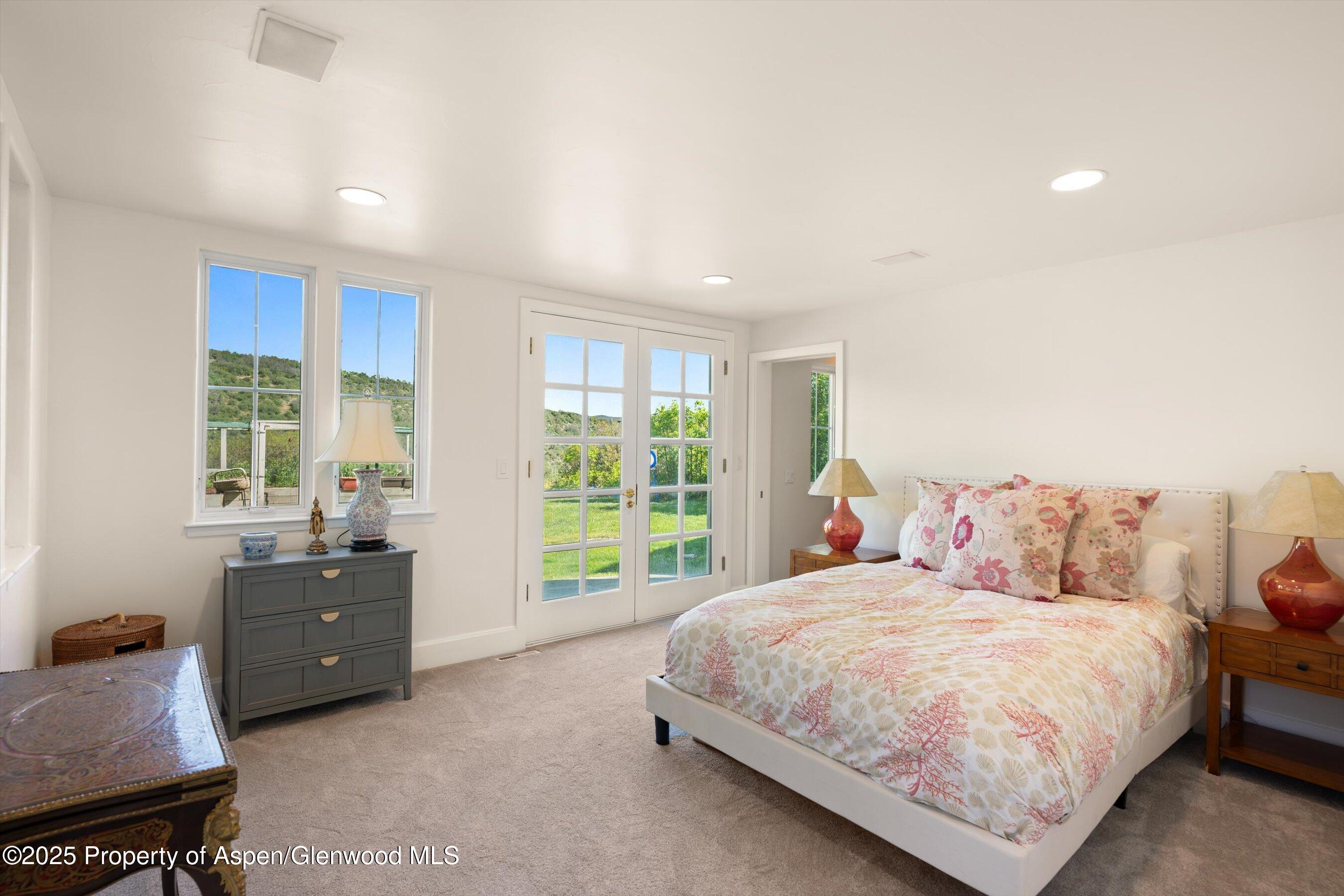 2240 Old Herron Road Basalt, CO 81621 - Photo 19 of 42 a bedroom with a bed and a window