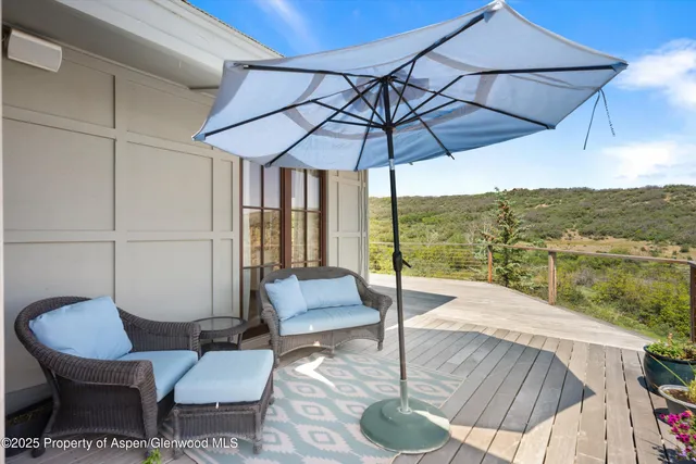 a view of a outdoor seating area with furniture