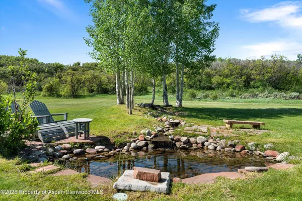 a view of an outdoor space with a garden