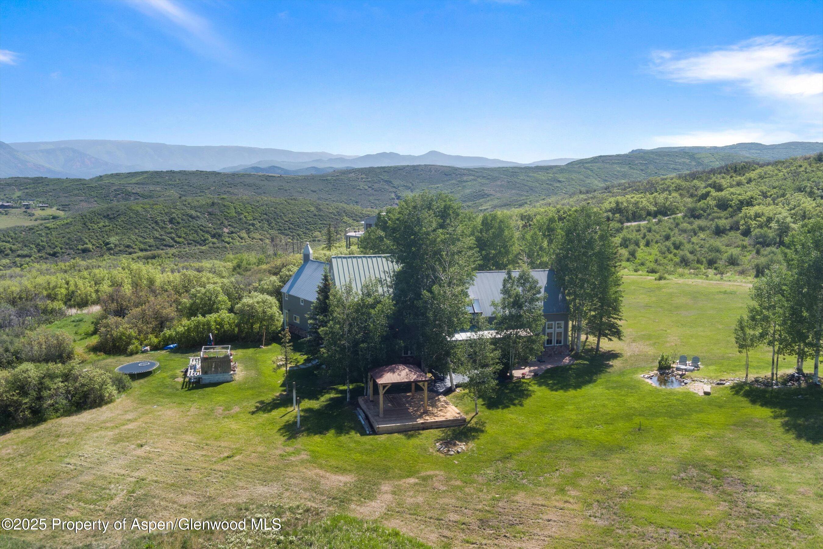 2240 Old Herron Road Basalt, CO 81621 - Photo 5 of 42 a view of a town with mountains in the background