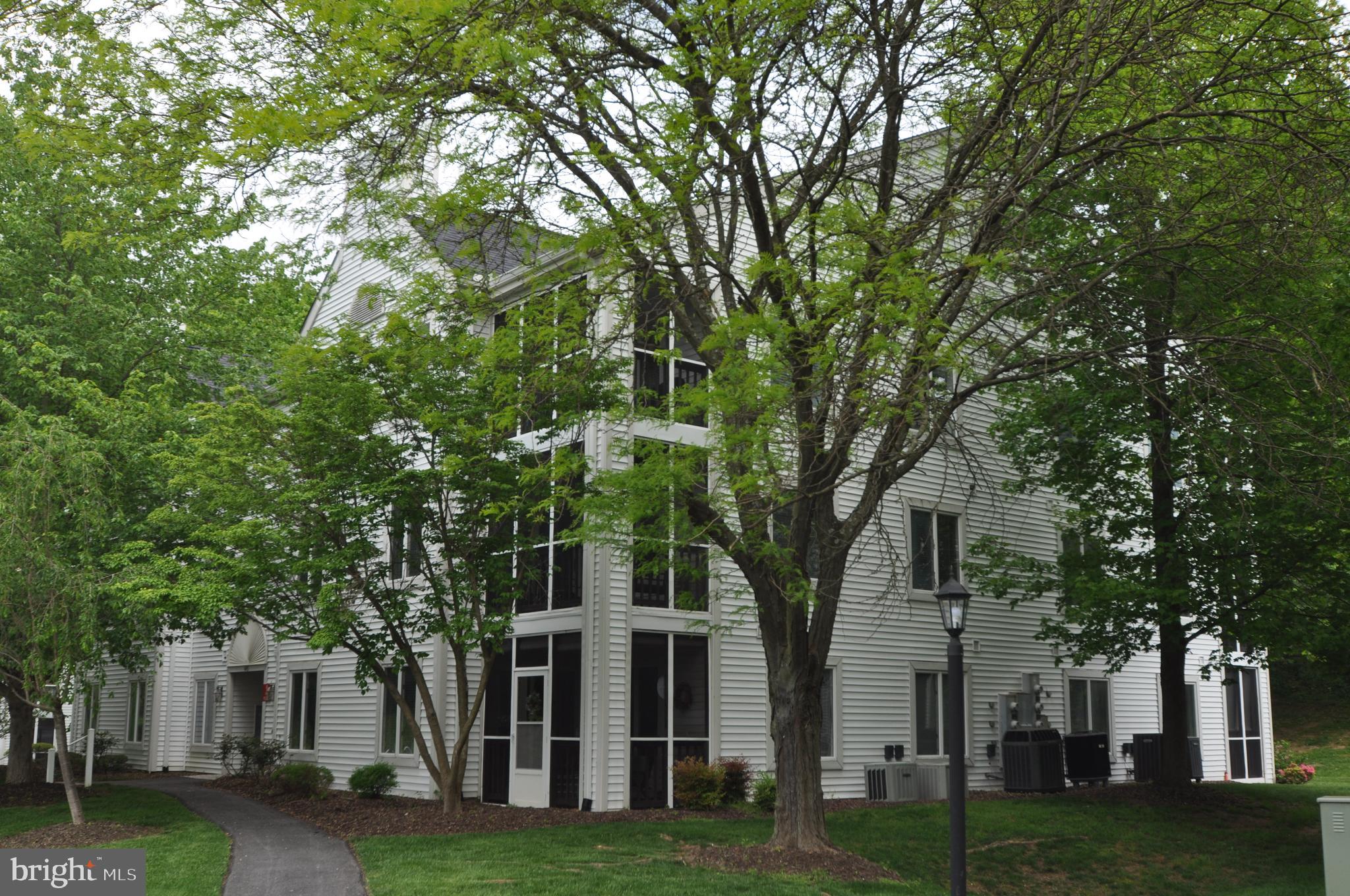 445 Pleasanton Road, Unit C33 Westminster, MD 21157 - Photo 2 of 25 Well maintained grounds with lots of mature trees
