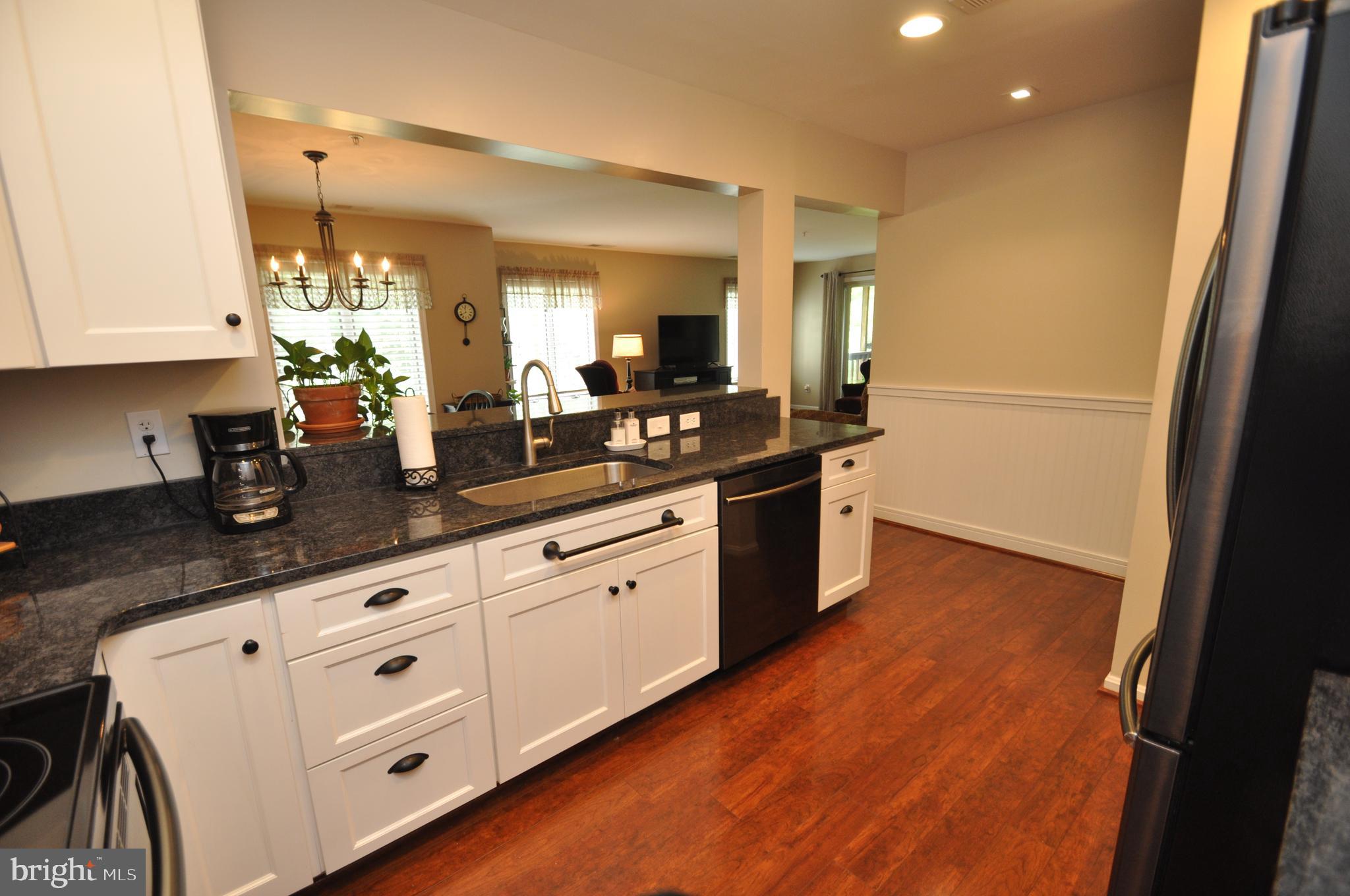 445 Pleasanton Road, Unit C33 Westminster, MD 21157 - Photo 11 of 25 Gleaming floors,kitchen ,dinning and living room