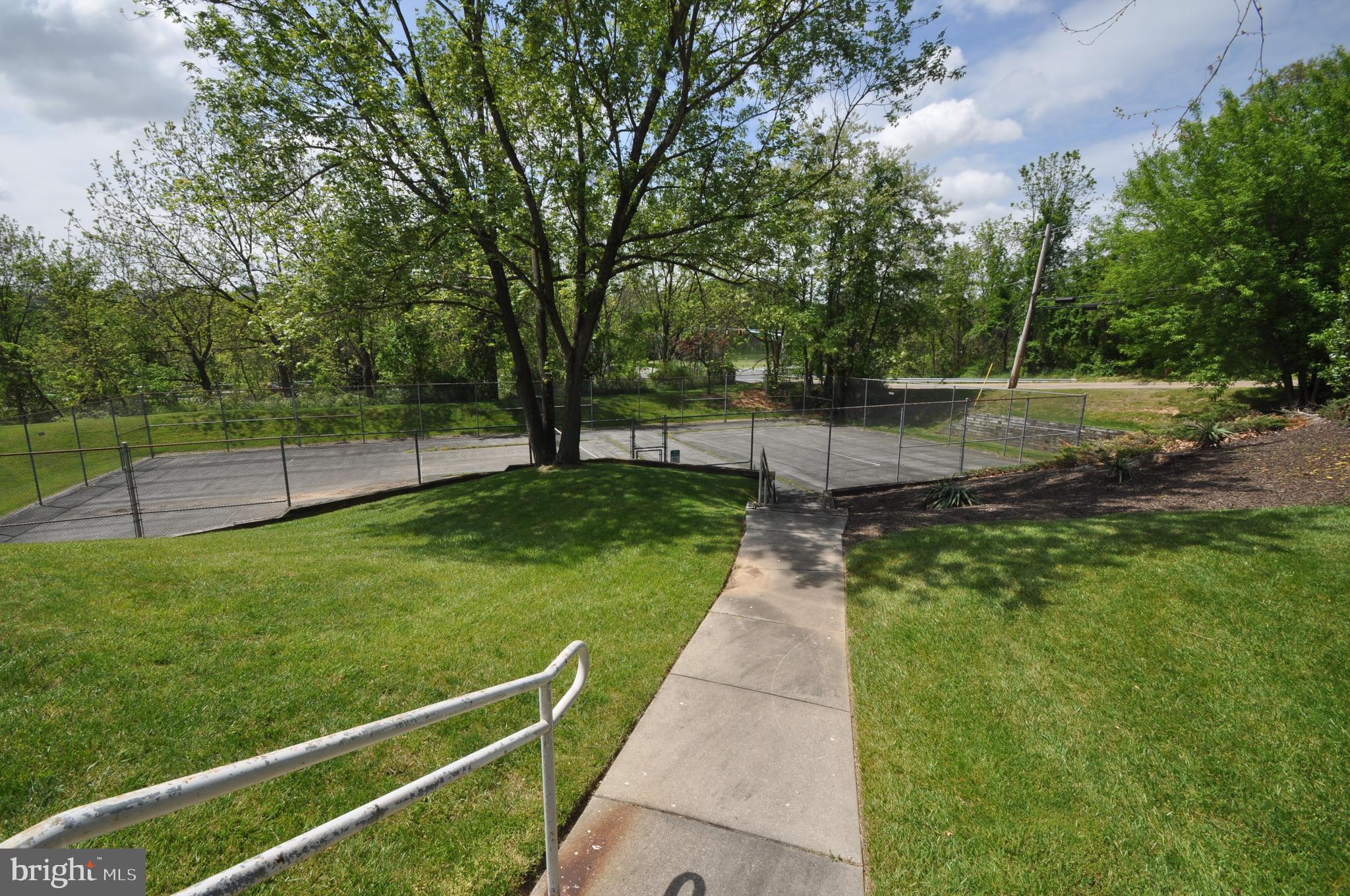 445 Pleasanton Road, Unit C33 Westminster, MD 21157 - Photo 23 of 25 Walkway to tennis courts