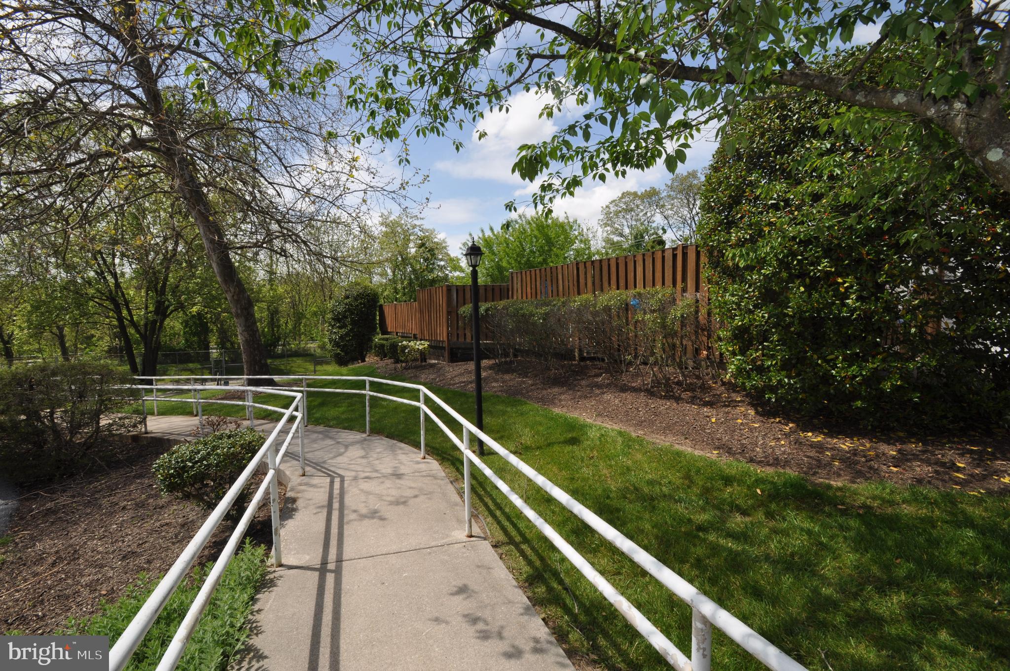 445 Pleasanton Road, Unit C33 Westminster, MD 21157 - Photo 24 of 25 Sidewalk leading to pool and community center