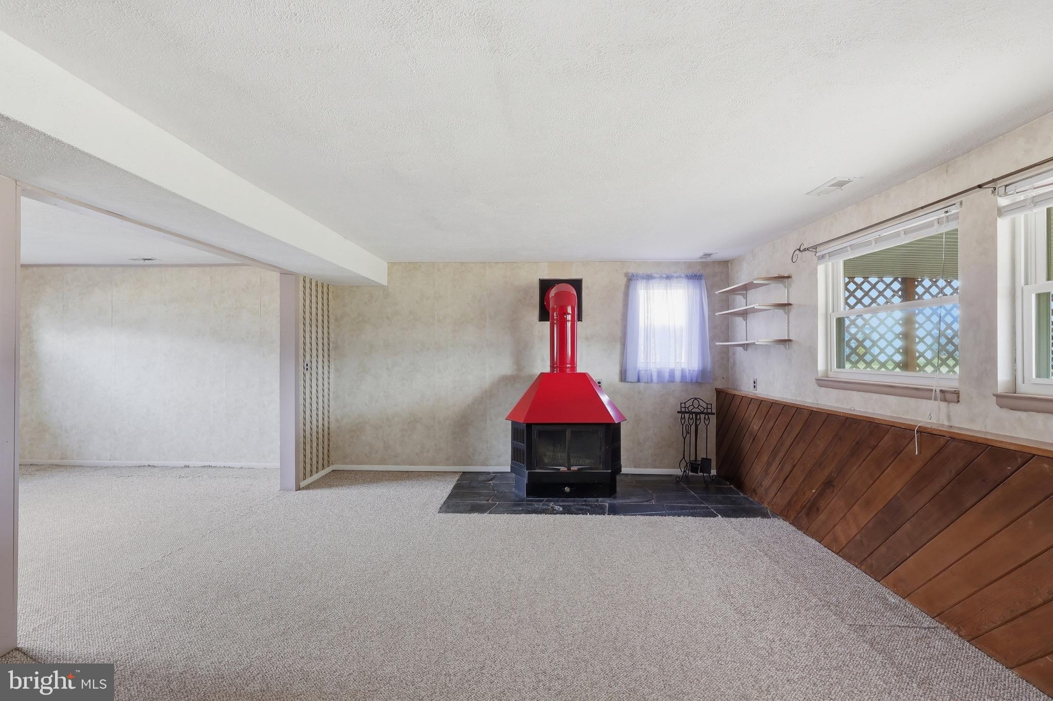 403 Byron Road Warminster, PA 18974 - Photo 39 of 76 Cozy Den features a wood-burning stove