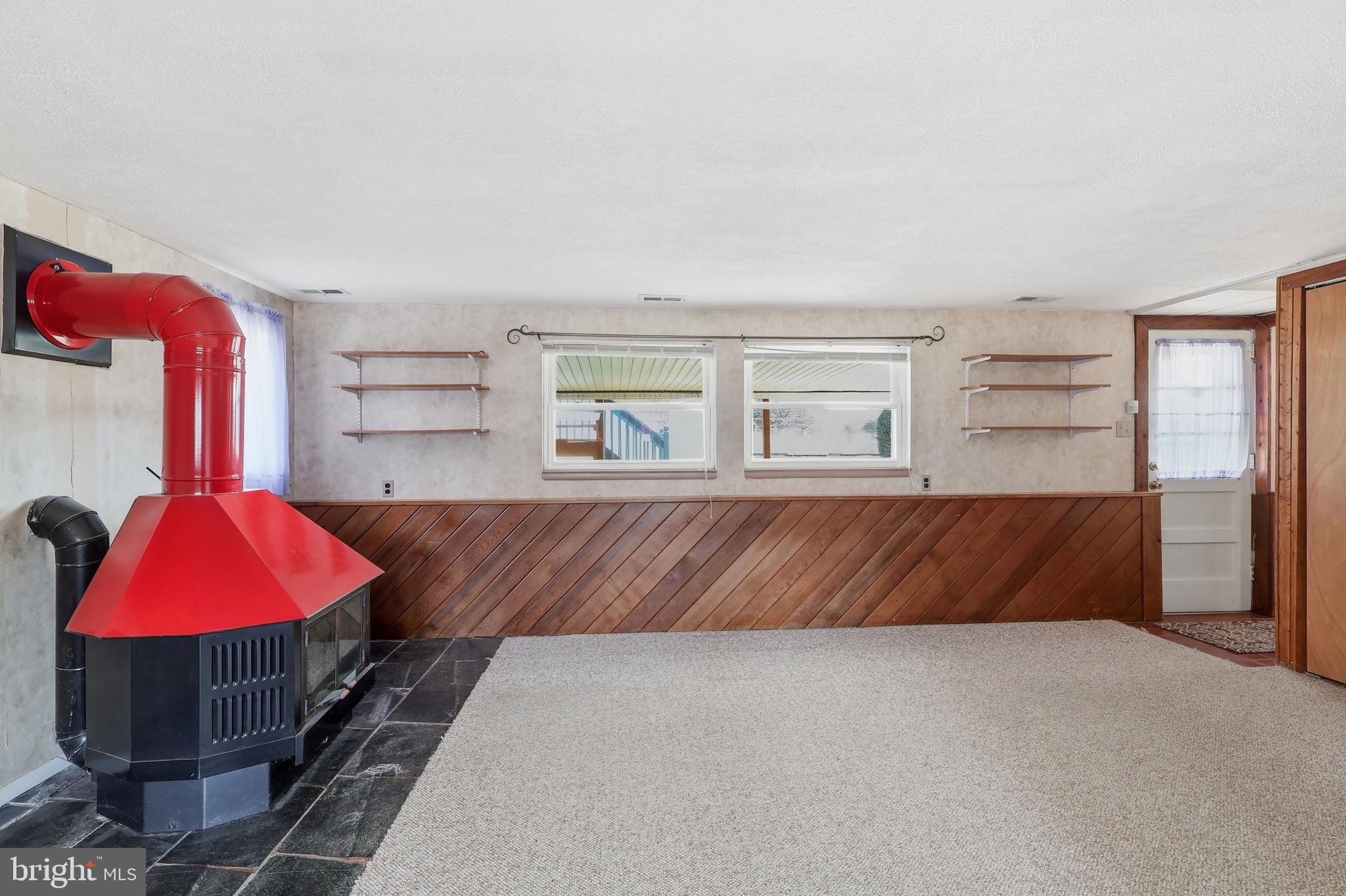 403 Byron Road Warminster, PA 18974 - Photo 40 of 76 Cozy Den features a wood-burning stove