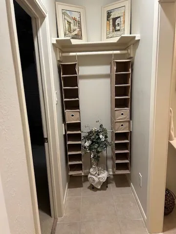 a view of entryway with workspace and window