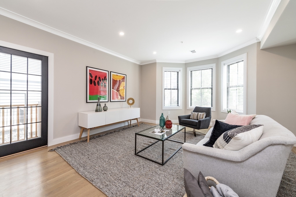 281 Lamartine Street Boston, MA 02130 - Photo 3 of 14 a living room with furniture and windows