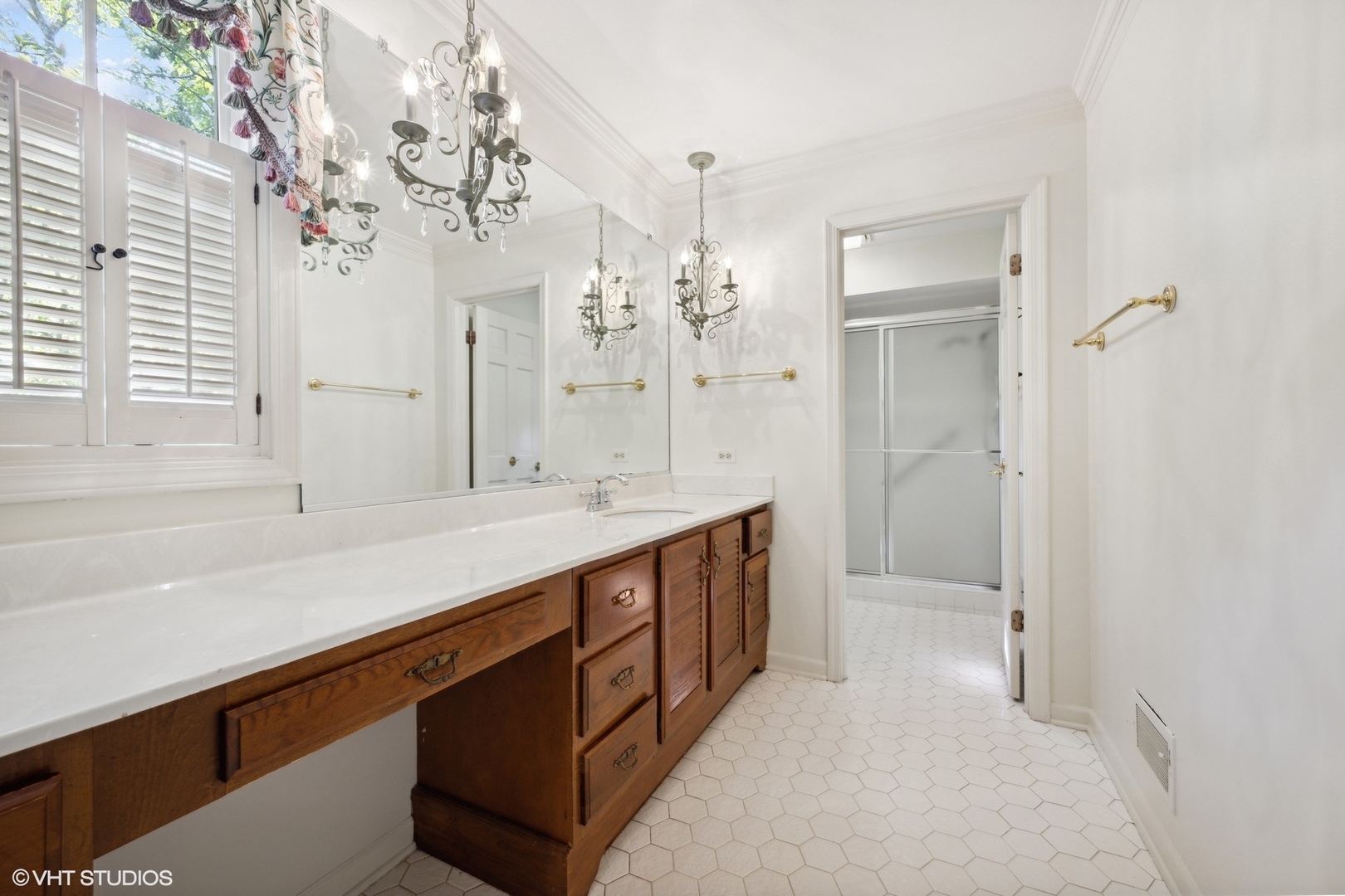 1100 Turicum Road Lake Forest, IL 60045 - Photo 19 of 38 a spacious bathroom with a double vanity sink a large mirror and shower