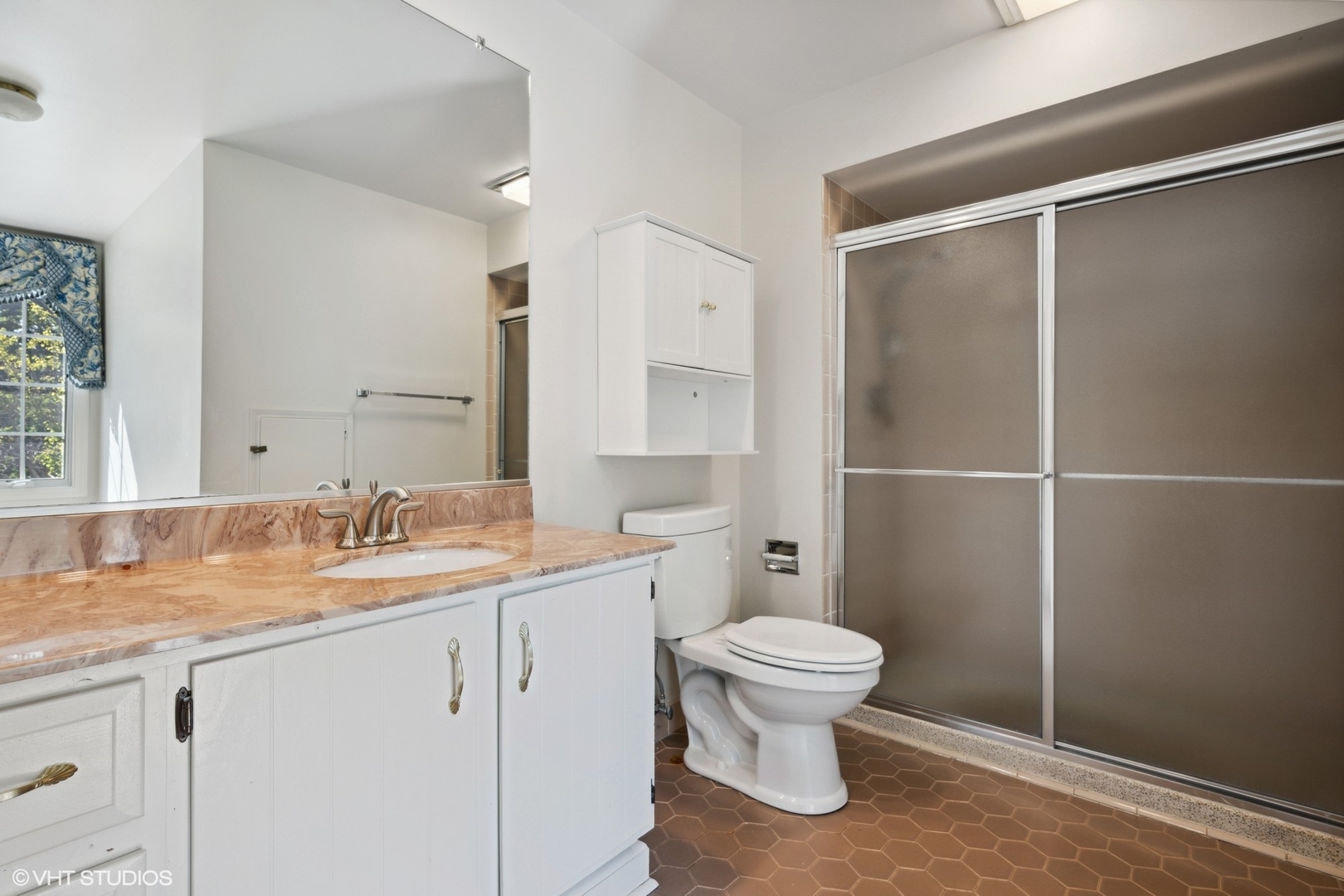 1100 Turicum Road Lake Forest, IL 60045 - Photo 23 of 38 a bathroom with a granite countertop sink toilet and shower