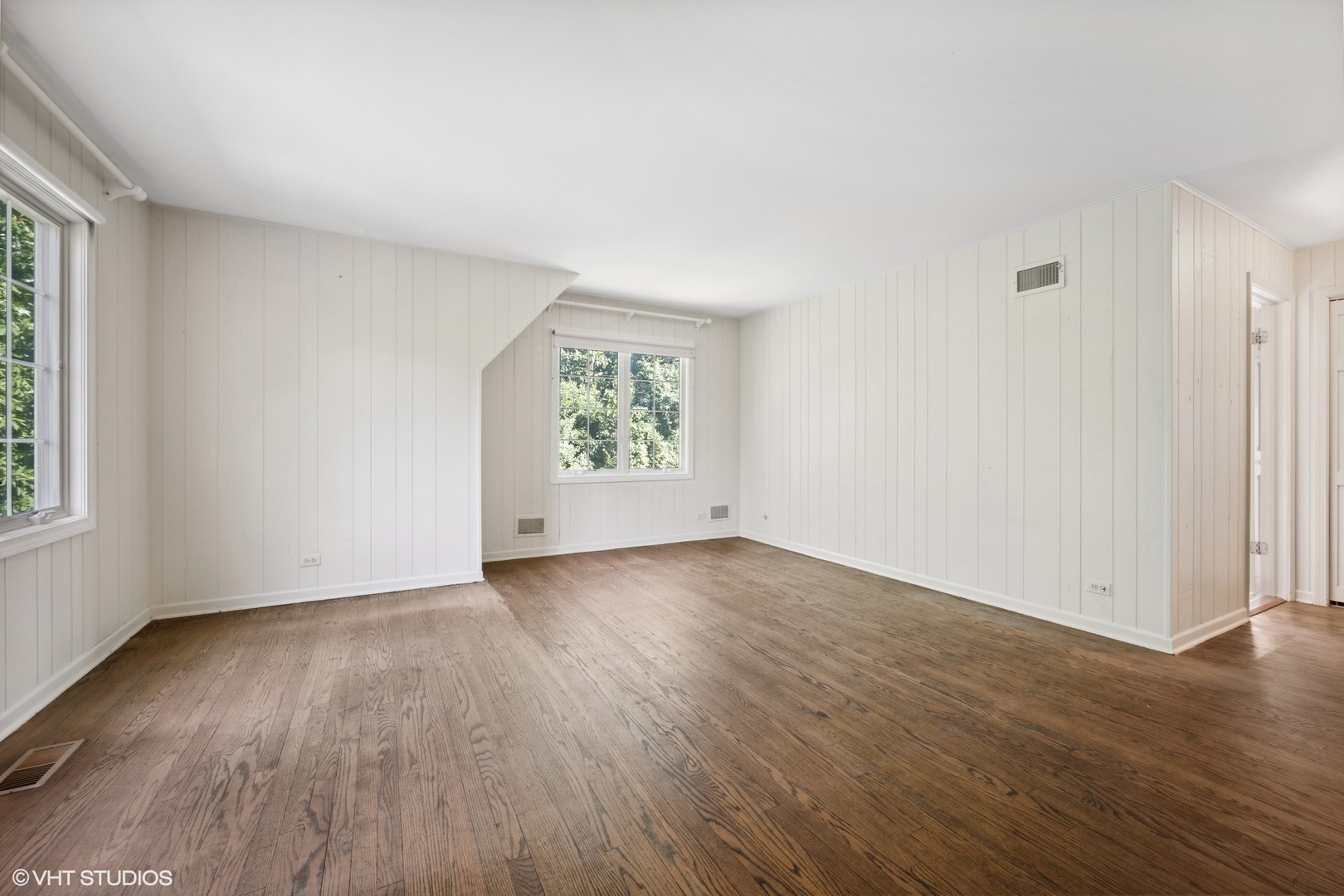 1100 Turicum Road Lake Forest, IL 60045 - Photo 24 of 38 an empty room with wooden floor and window