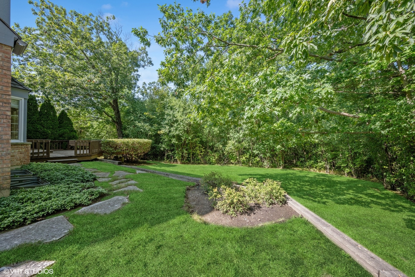 1100 Turicum Road Lake Forest, IL 60045 - Photo 33 of 38 a view of a garden with a fountain