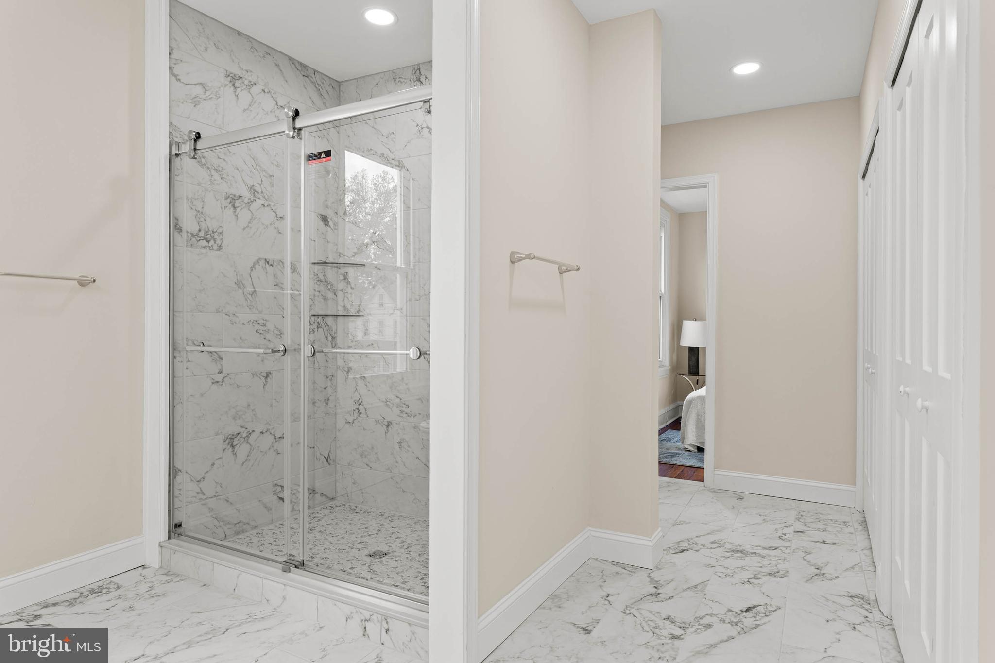 115 President Avenue Rutledge, PA 19070 - Photo 19 of 34 a bathroom with a shower and a sink