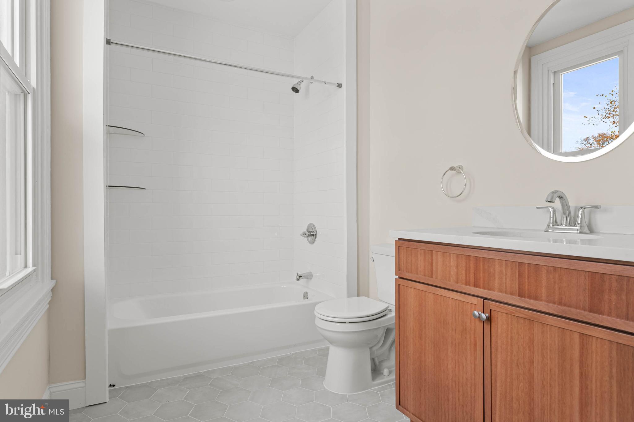 115 President Avenue Rutledge, PA 19070 - Photo 23 of 34 a bathroom with a sink a toilet and shower