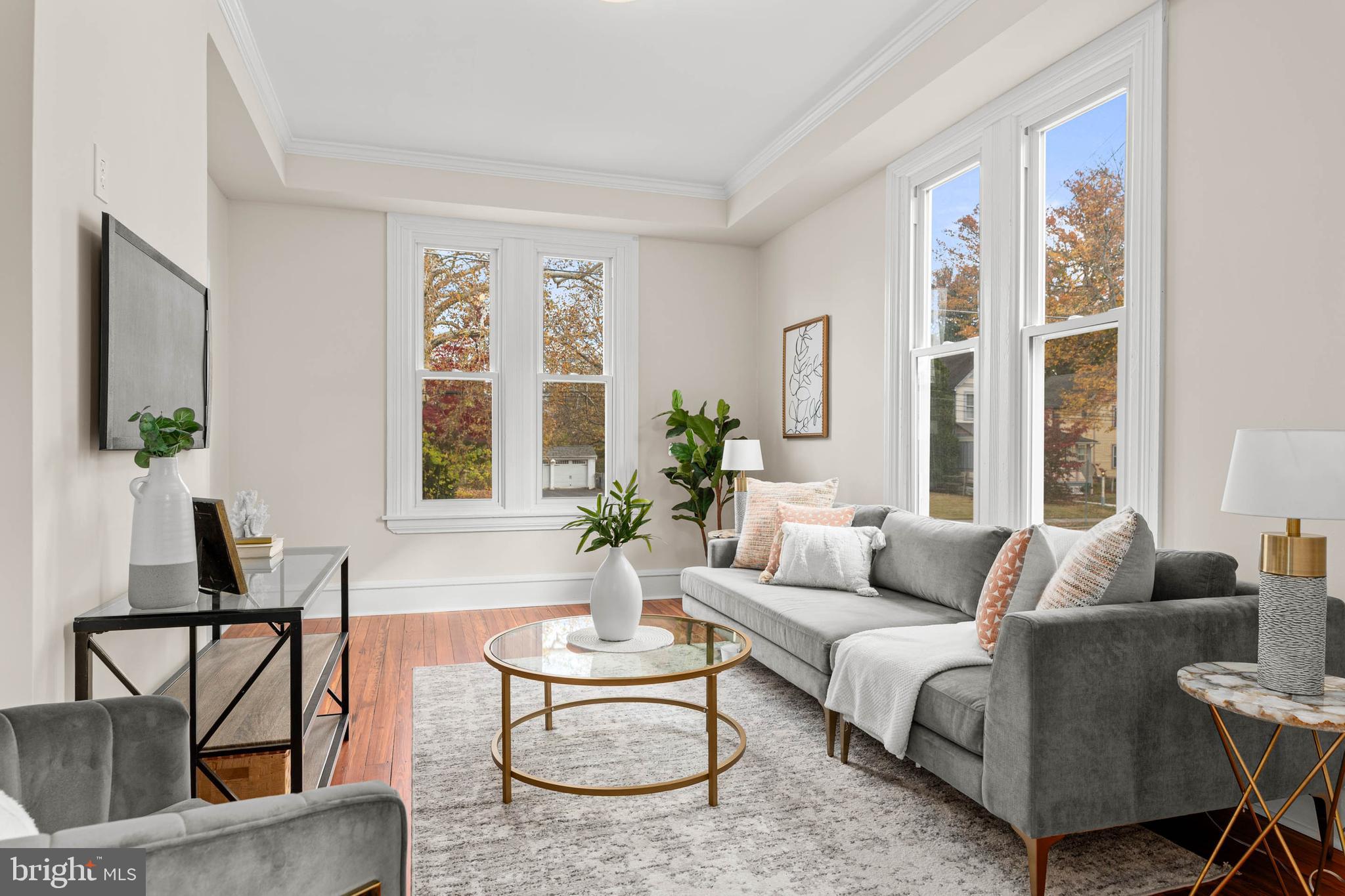 115 President Avenue Rutledge, PA 19070 - Photo 5 of 34 a living room with furniture and a large window