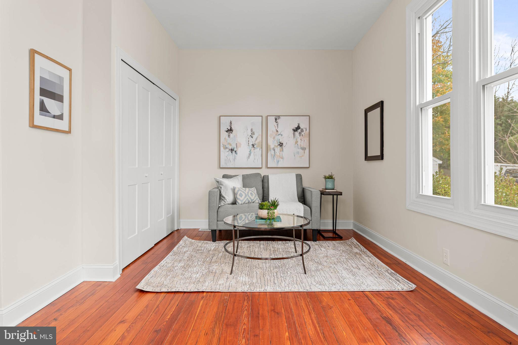115 President Avenue Rutledge, PA 19070 - Photo 10 of 34 a living room with furniture and a rug