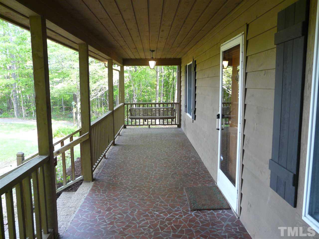 6815 Guess Road Rougemont, NC 27572 - Photo 3 of 20 a view of a porch