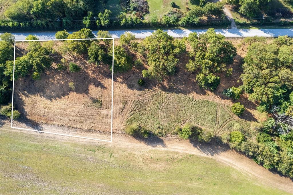 Lot 5 Mcfarlin Road Collinsville, TX 76233 - Photo 2 of 2 a view of a lake