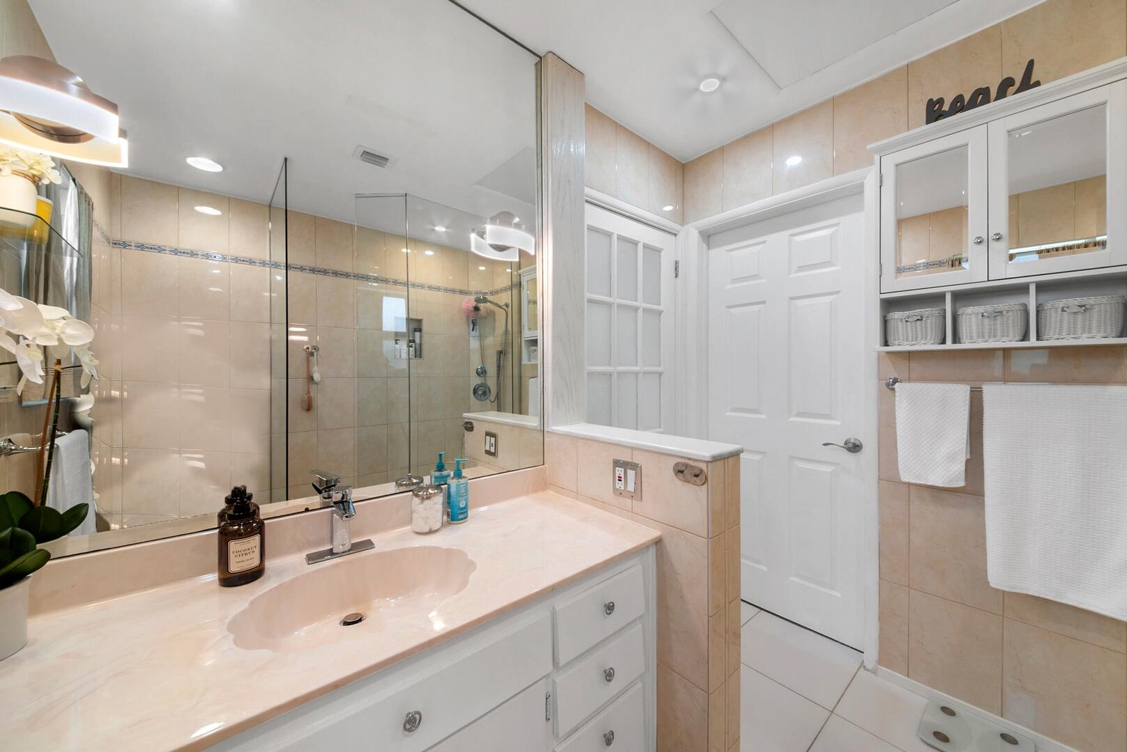 220 Southeast 2nd Avenue Pompano Beach, FL 33060 - Photo 18 of 43 a bathroom with a sink double vanity and a shower