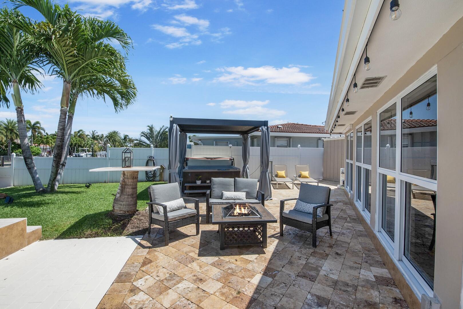 220 Southeast 2nd Avenue Pompano Beach, FL 33060 - Photo 20 of 43 a view of a patio with a table and chairs