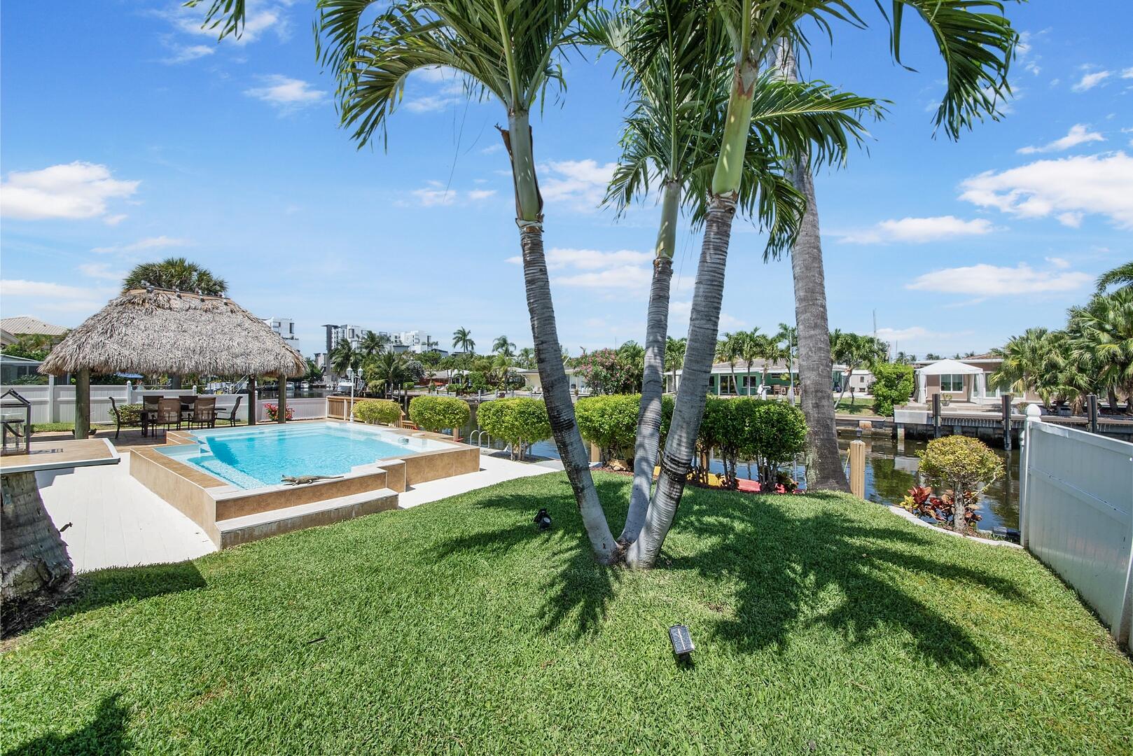 220 Southeast 2nd Avenue Pompano Beach, FL 33060 - Photo 26 of 43 a view of a garden with palm trees