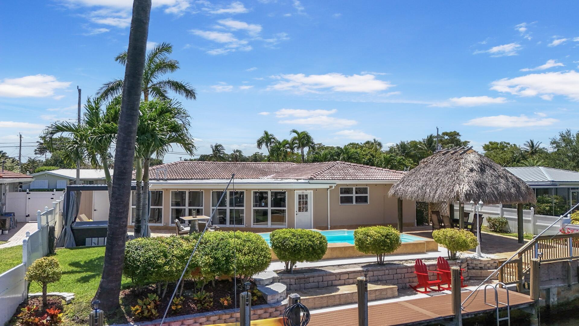 220 Southeast 2nd Avenue Pompano Beach, FL 33060 - Photo 30 of 43 a view of backyard with outdoor seating and green space