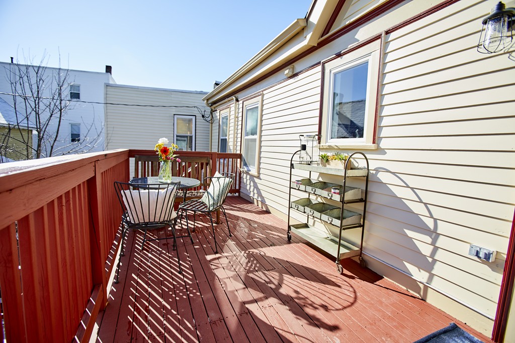 56 Hinckley Street, Unit 2 Somerville, MA 02145 - Photo 12 of 18 a view of balcony with patio