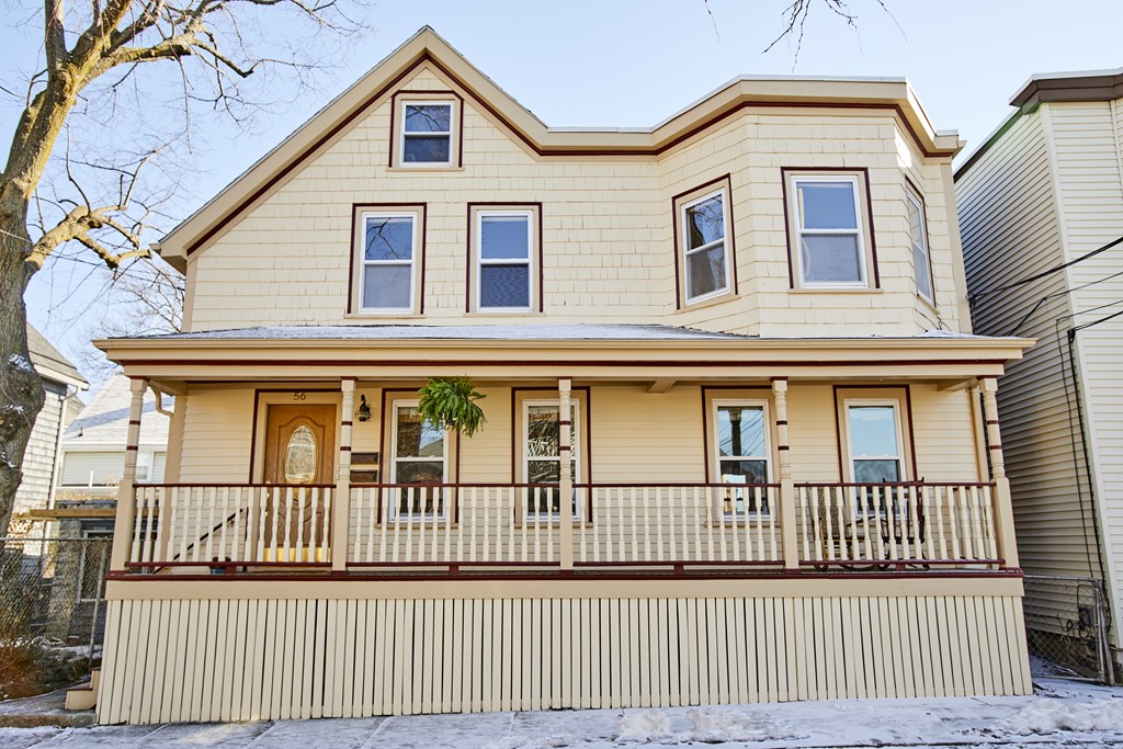 56 Hinckley Street, Unit 2 Somerville, MA 02145 - Photo 14 of 18 a view of a brick house with a window
