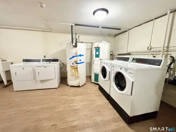 a utility room with dryer and washer