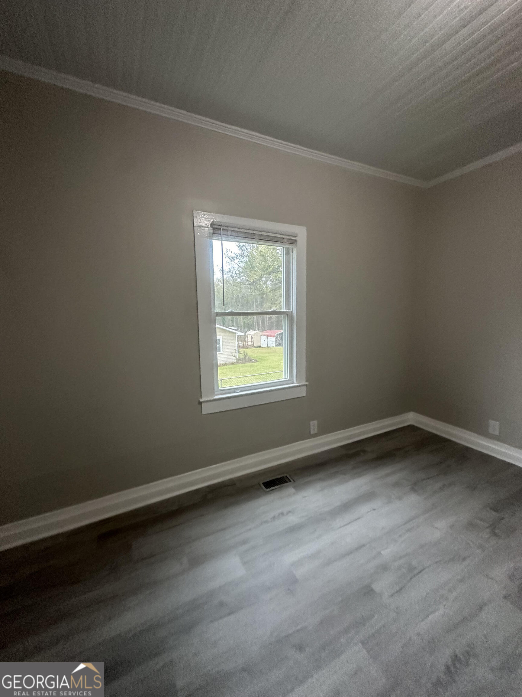 193 Frazier Drive Southeast Milledgeville, GA 31061 - Photo 20 of 38 an empty room with a window