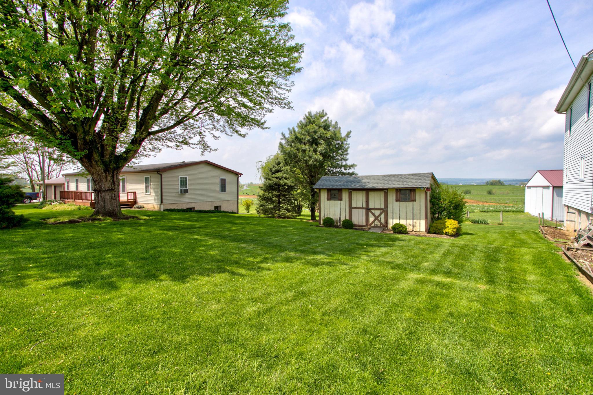 494 Compass Road Gap, PA 17527 - Photo 117 of 127 a front view of house with yard and green space