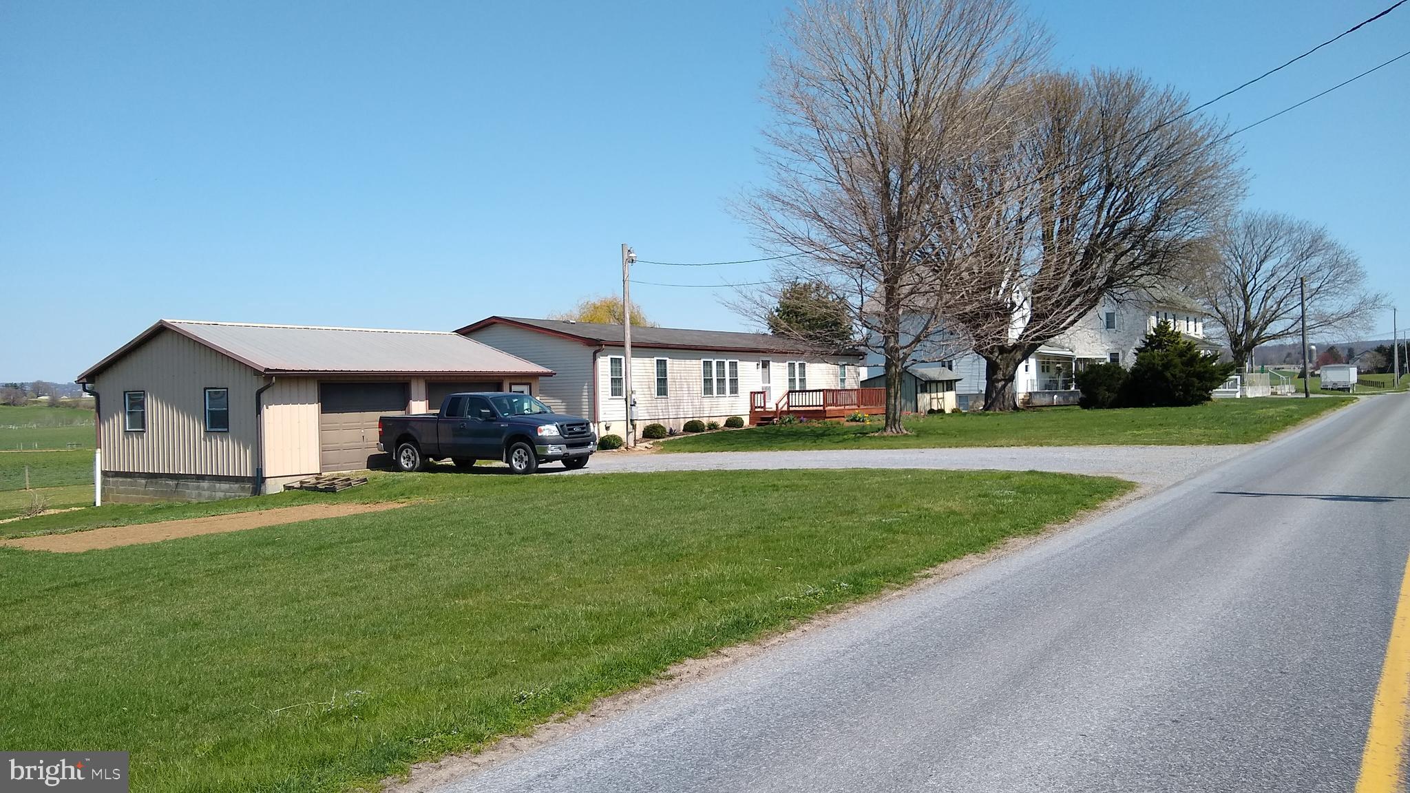 494 Compass Road Gap, PA 17527 - Photo 118 of 127 a front view of a house with a yard and trees