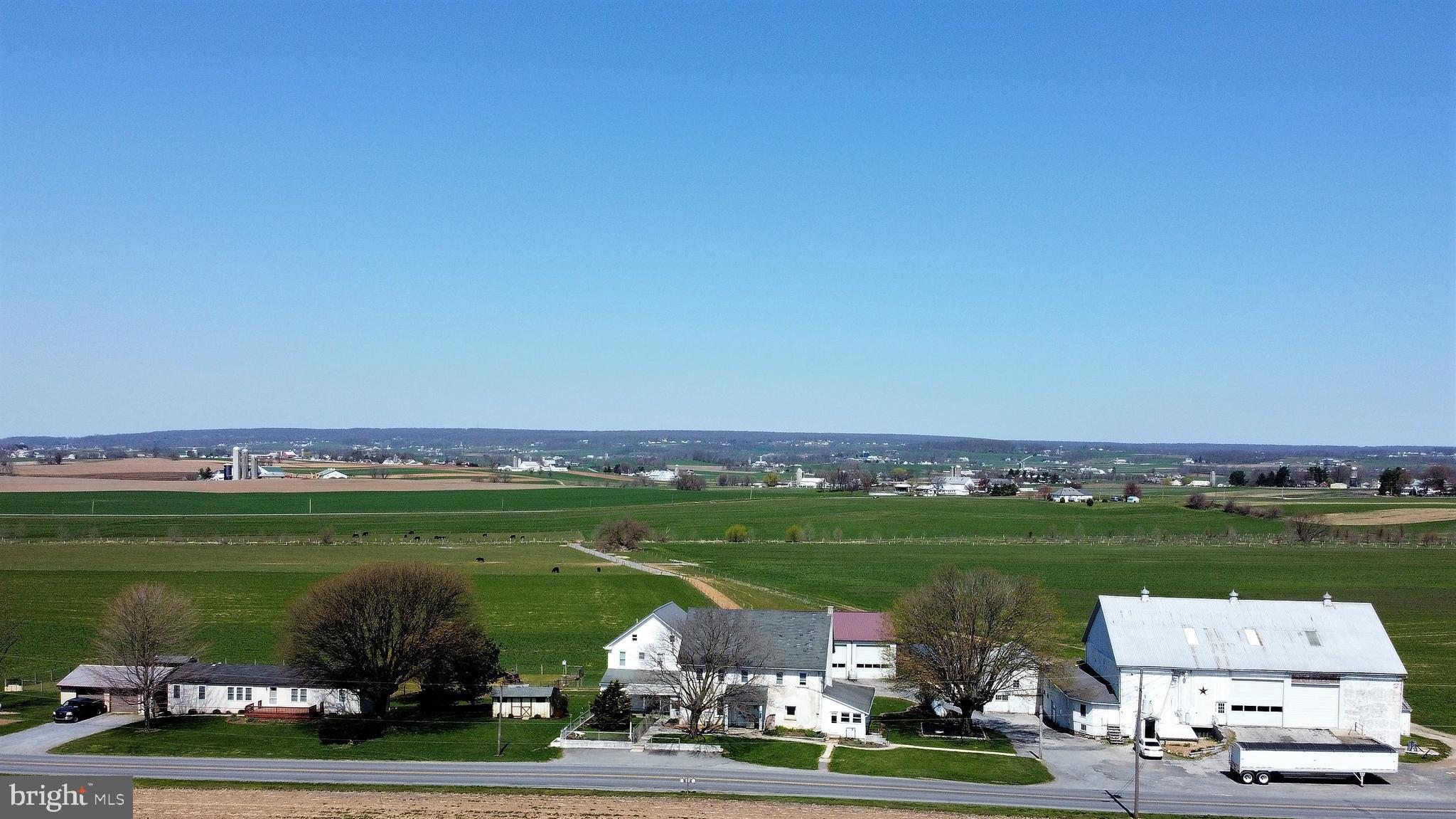 494 Compass Road Gap, PA 17527 - Photo 24 of 127 an aerial view of a residential houses with outdoor space and lake view