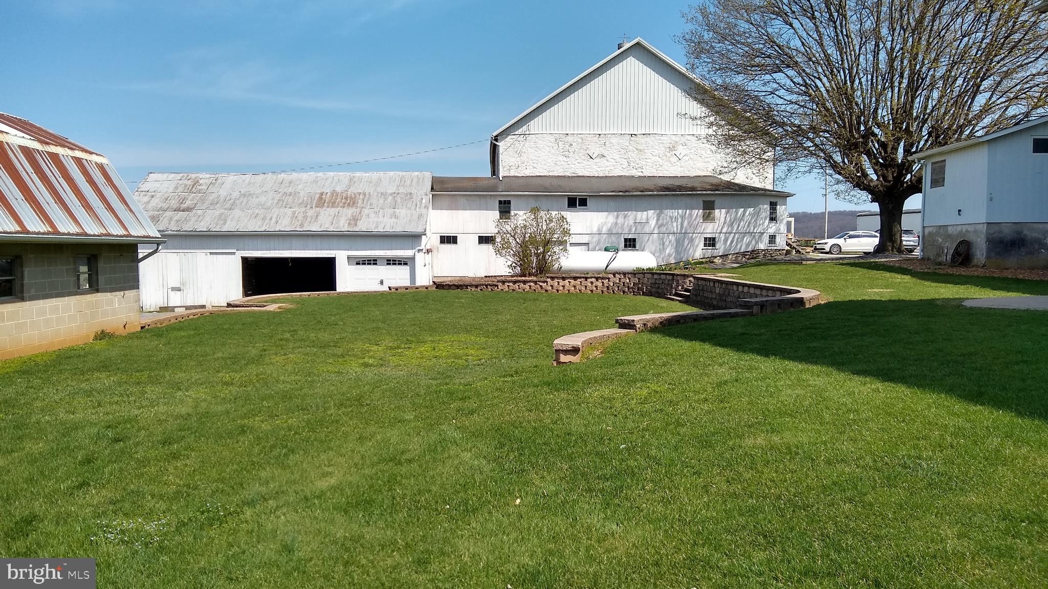 494 Compass Road Gap, PA 17527 - Photo 26 of 127 a view of a house with a yard and sitting area