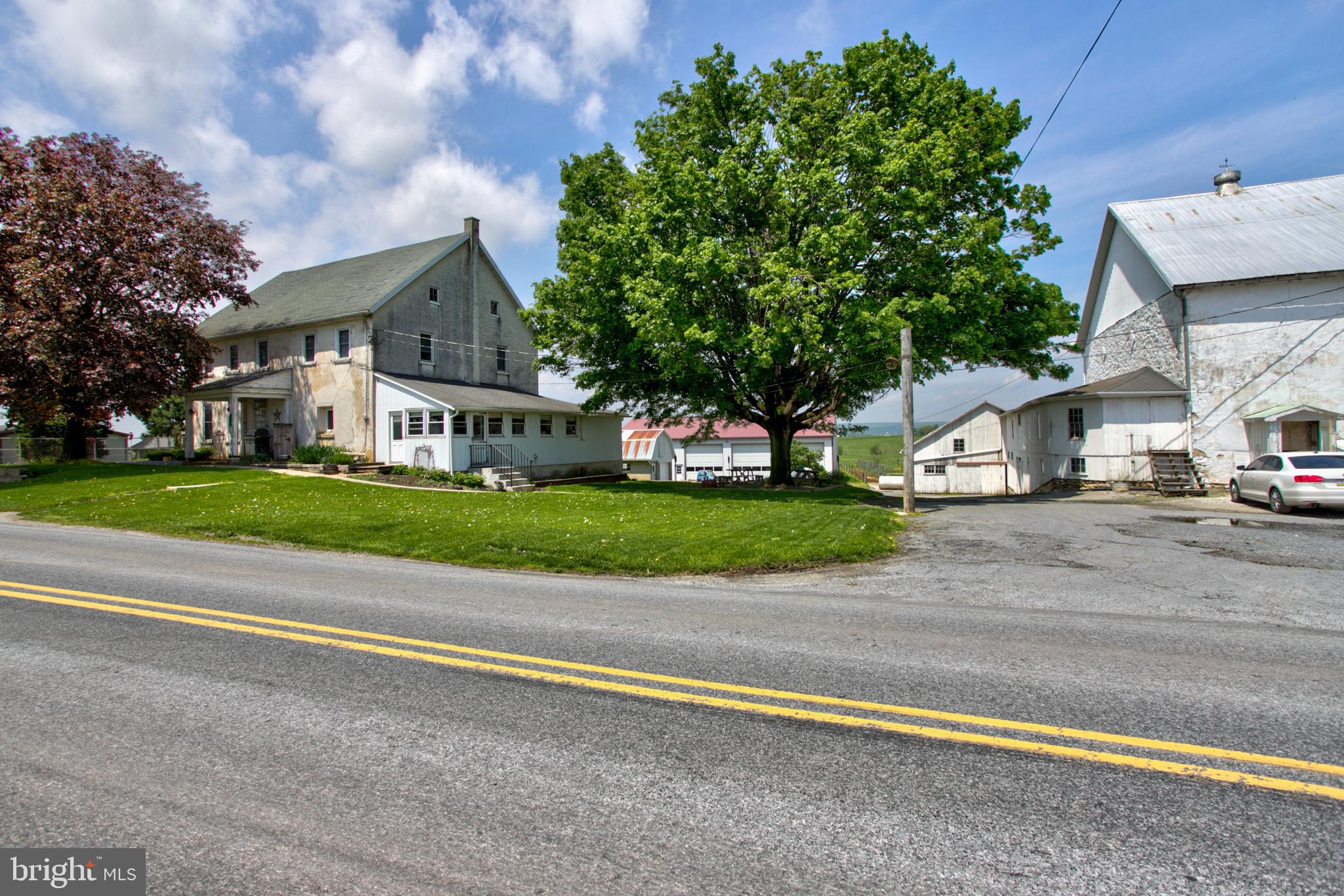 494 Compass Road Gap, PA 17527 - Photo 28 of 127 a front view of house with yard and green space