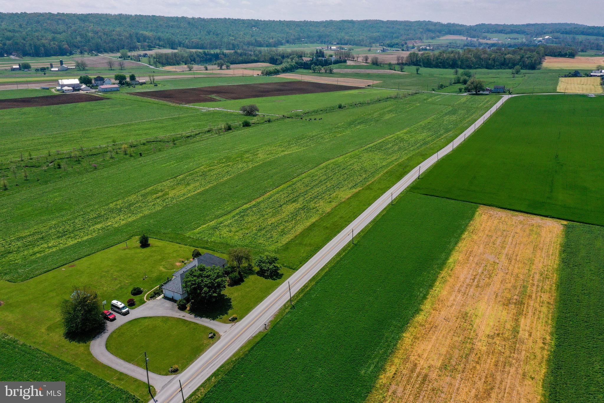 494 Compass Road Gap, PA 17527 - Photo 52 of 127 an aerial view of a golf course with a garden