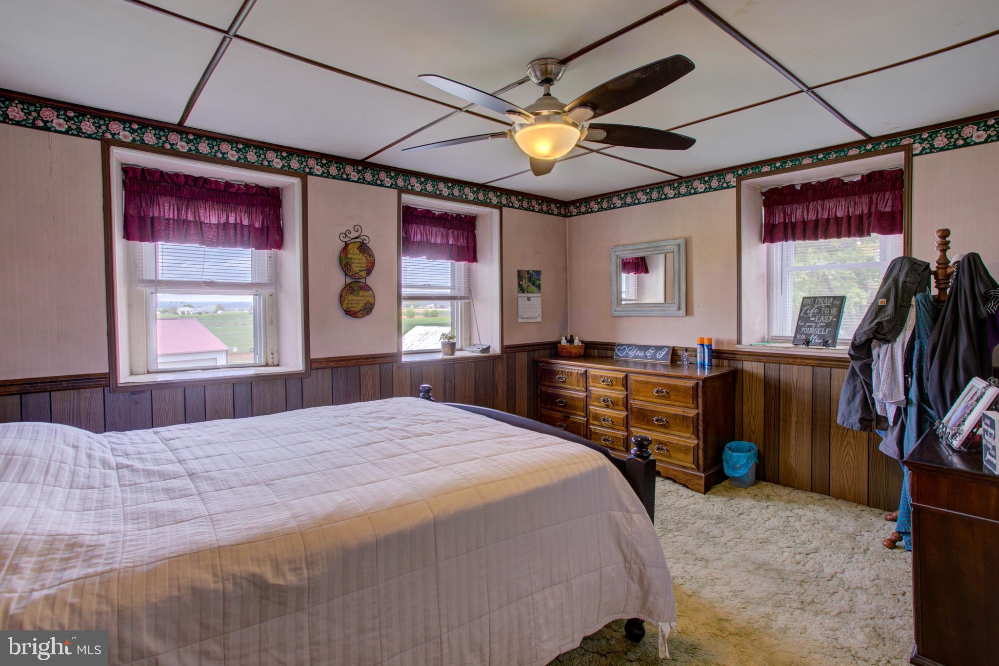 494 Compass Road Gap, PA 17527 - Photo 78 of 127 a bedroom with a bed and a large mirror