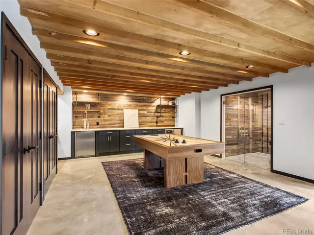 a view of a open kitchen with a sink