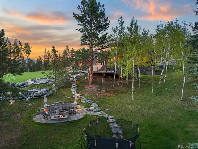 a garden view with a fountain