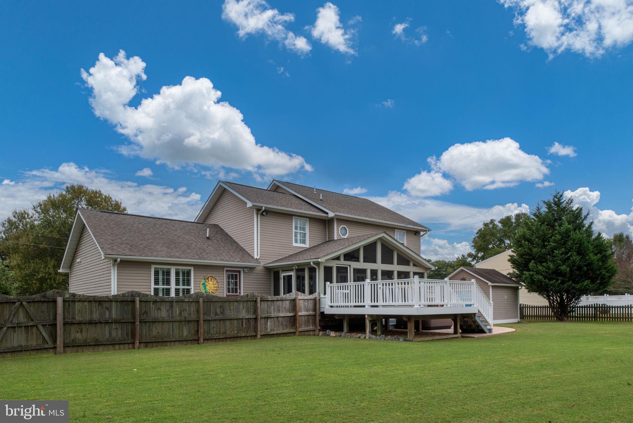 95 Potomac Lane Colonial Beach, VA 22443 - Photo 15 of 101 a front view of a house with a garden and plants