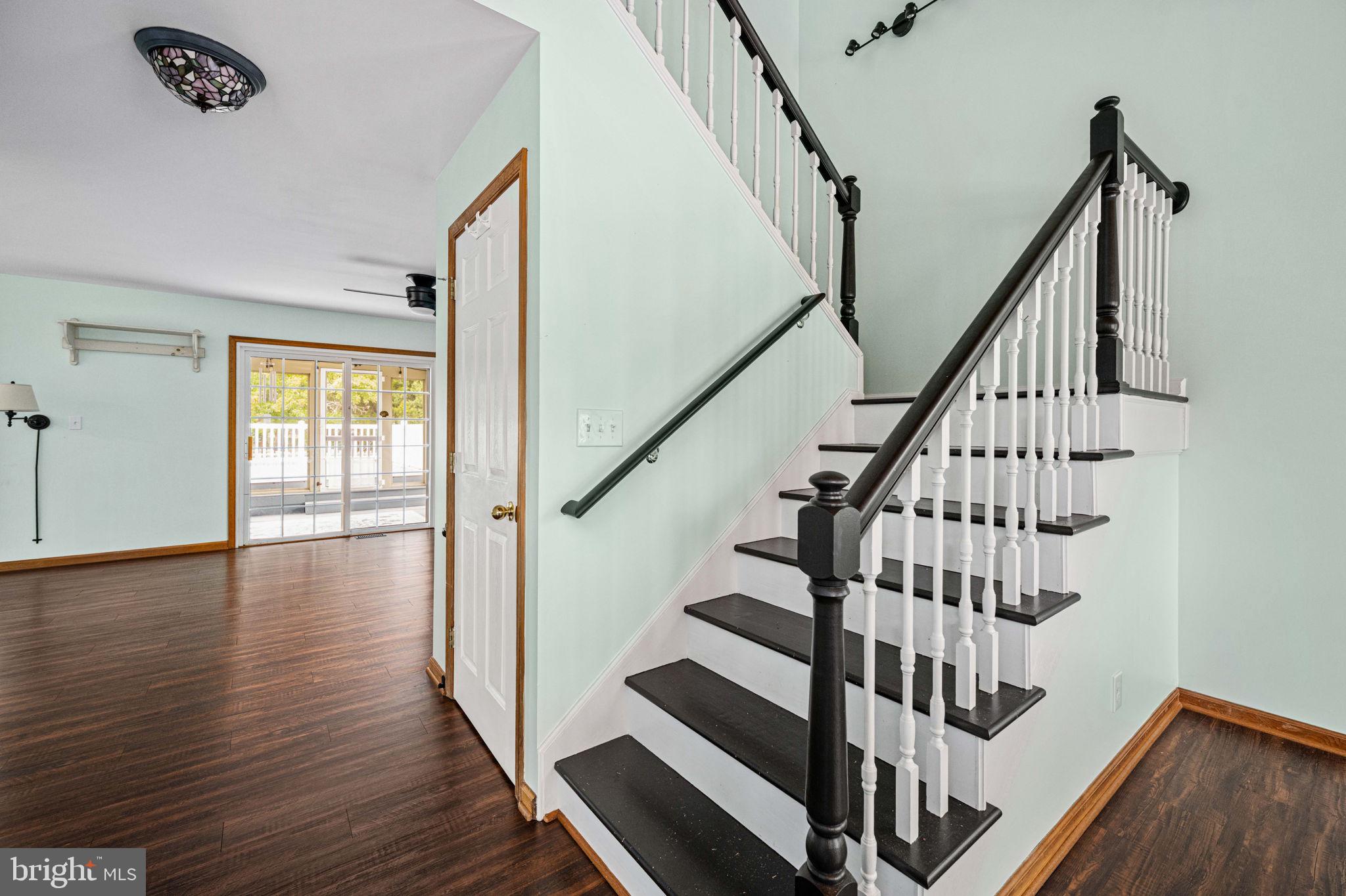 95 Potomac Lane Colonial Beach, VA 22443 - Photo 43 of 101 a view of entryway with wooden floor and stairs