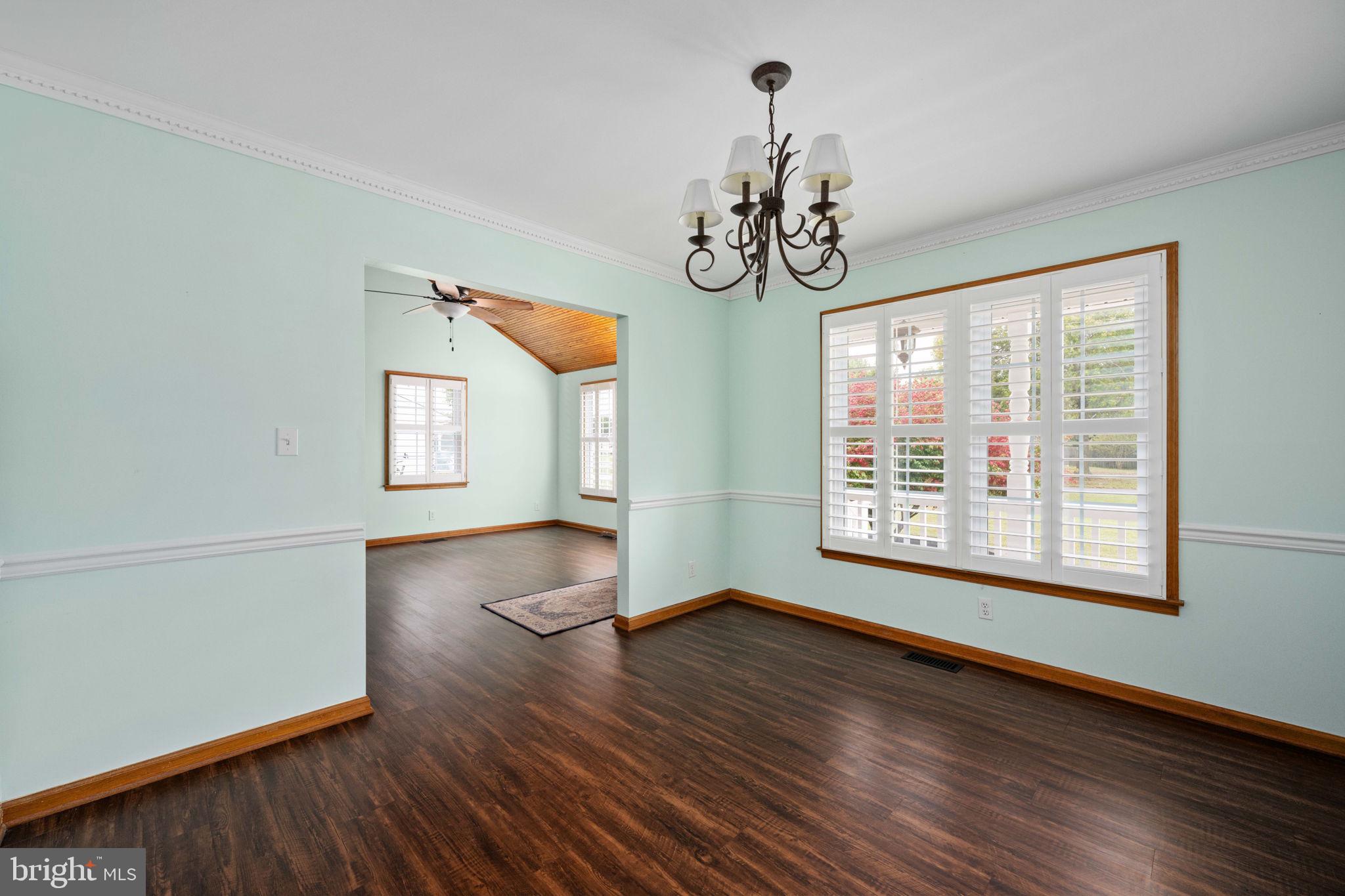 95 Potomac Lane Colonial Beach, VA 22443 - Photo 46 of 101 a view of a room with wooden floor and windows