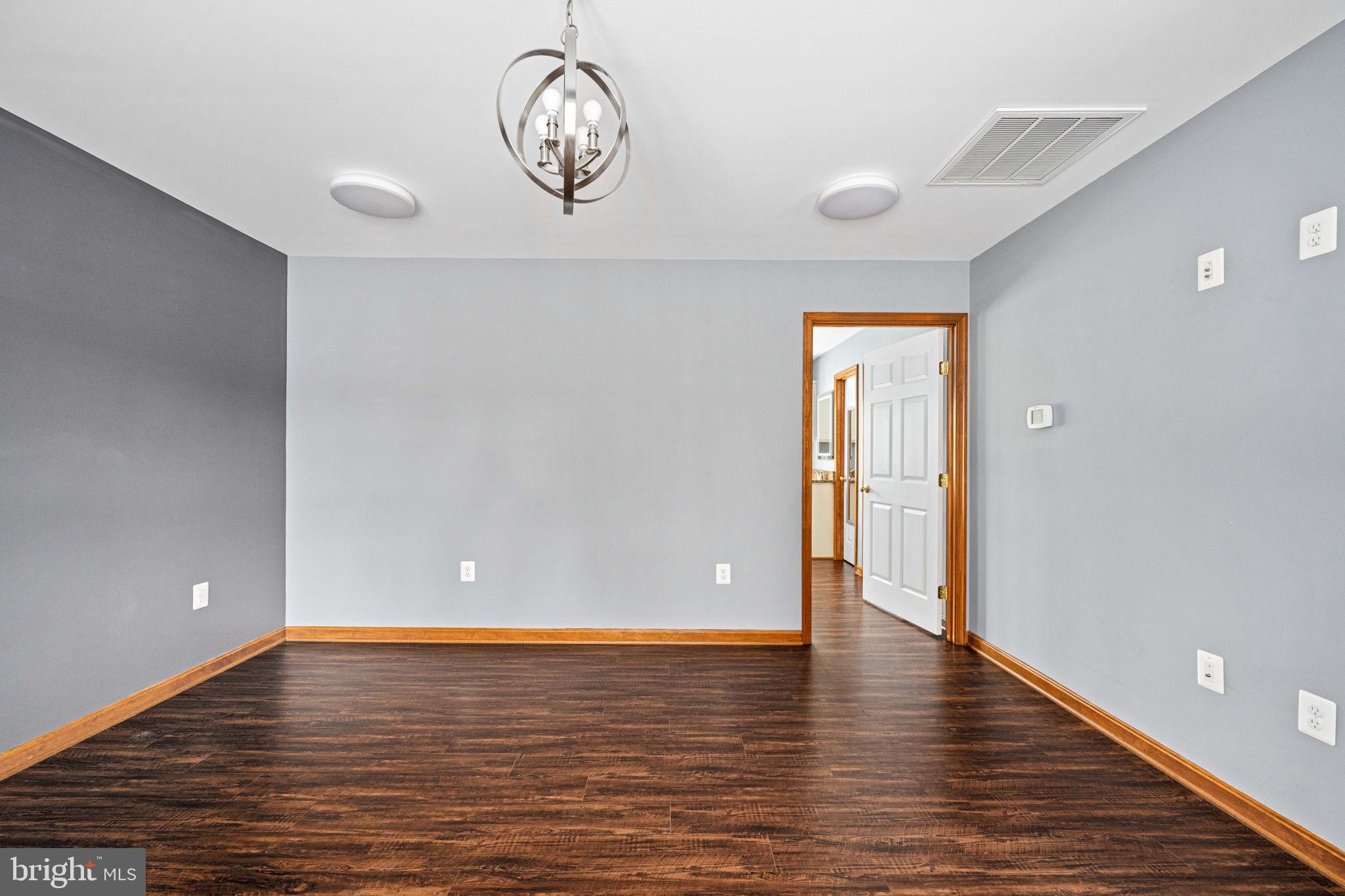 95 Potomac Lane Colonial Beach, VA 22443 - Photo 70 of 101 a view of room with window and wooden floor