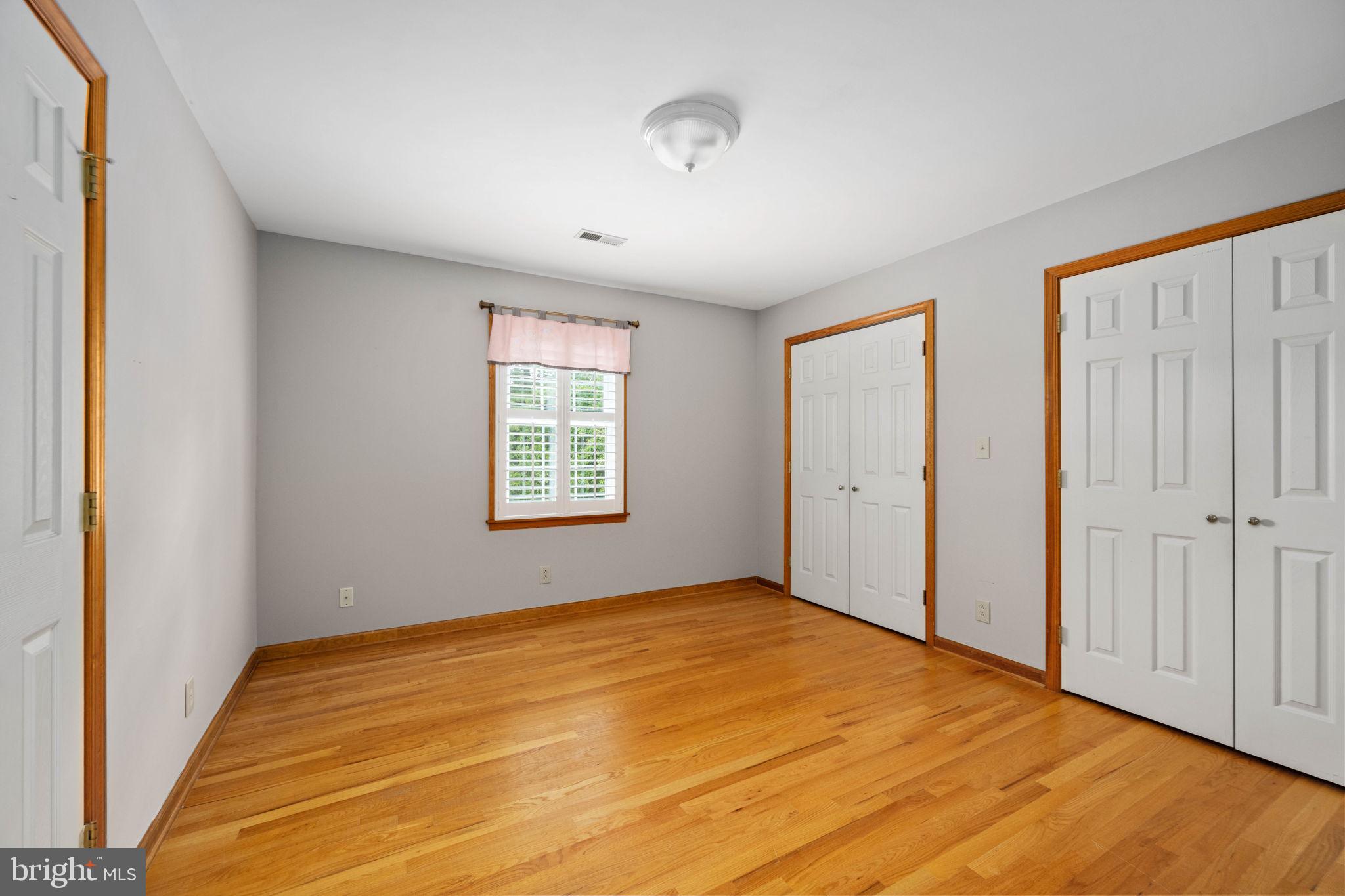 95 Potomac Lane Colonial Beach, VA 22443 - Photo 89 of 101 a view of empty room with wooden floor and fan