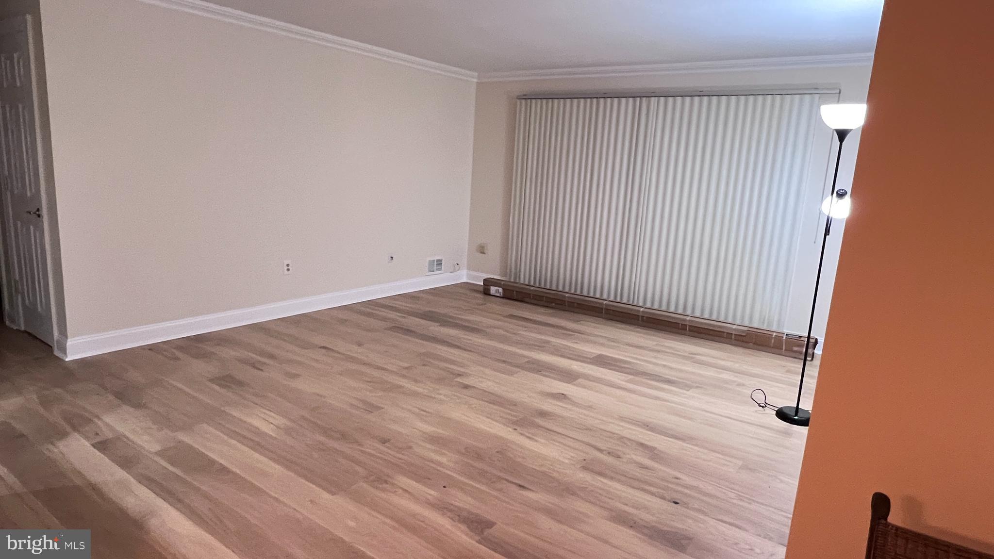 7 Voscek Court Lawrence Township, NJ 08648 - Photo 13 of 19 a view of an empty room with wooden floor