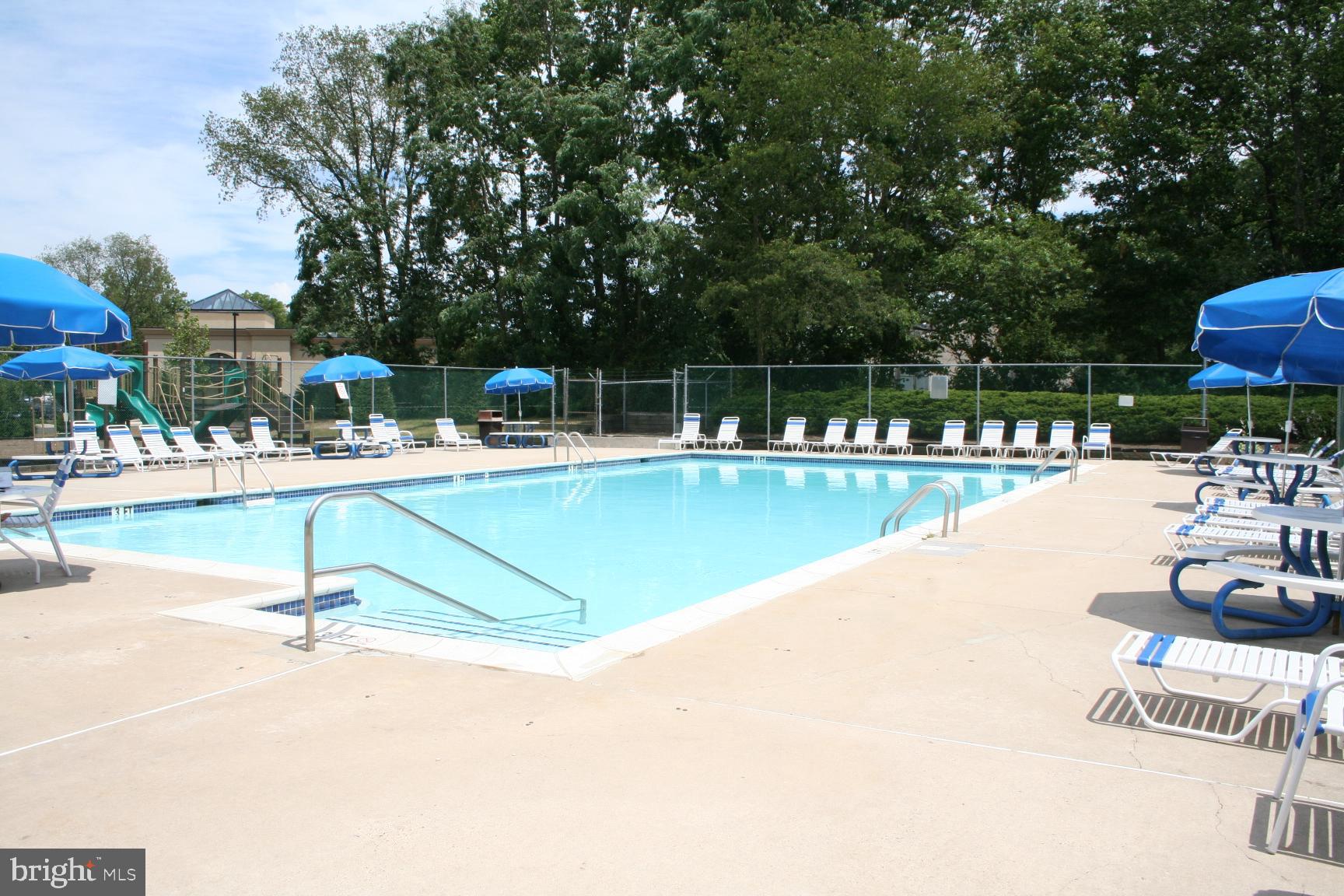 7 Voscek Court Lawrence Township, NJ 08648 - Photo 15 of 19 a view of a swimming pool with a patio