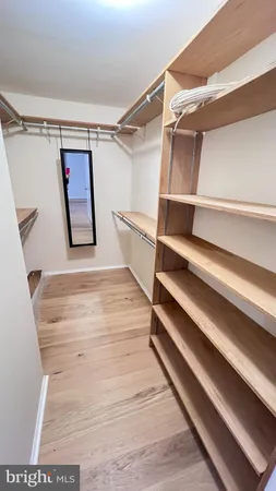 a view of a bathroom from a hallway